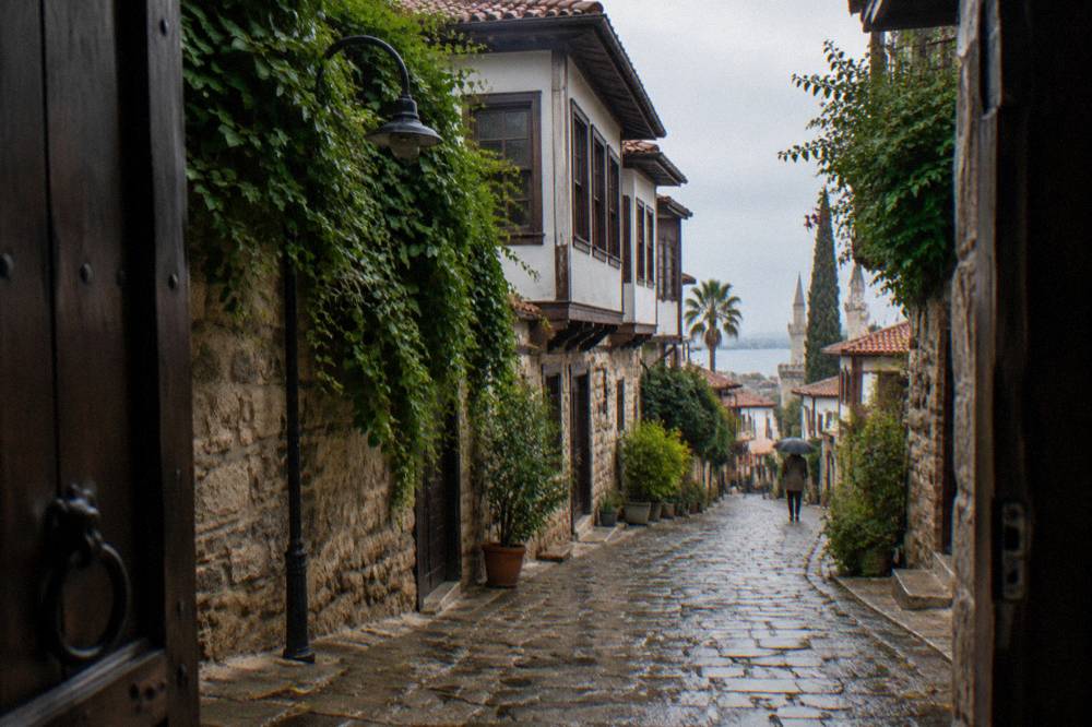 A narrow old town lane lined with traditional houses in Kaleici, Antalya