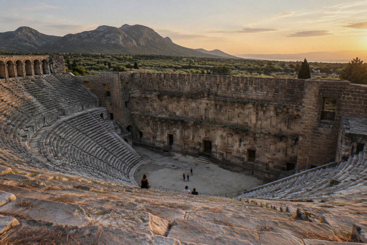 The Roman theatre of Aspendos seen from its upper seating rows under an open sky