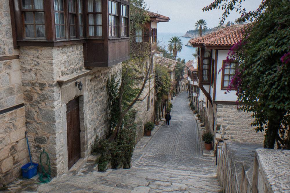 Old stone houses along a narrow Kaleici lane in Antalya