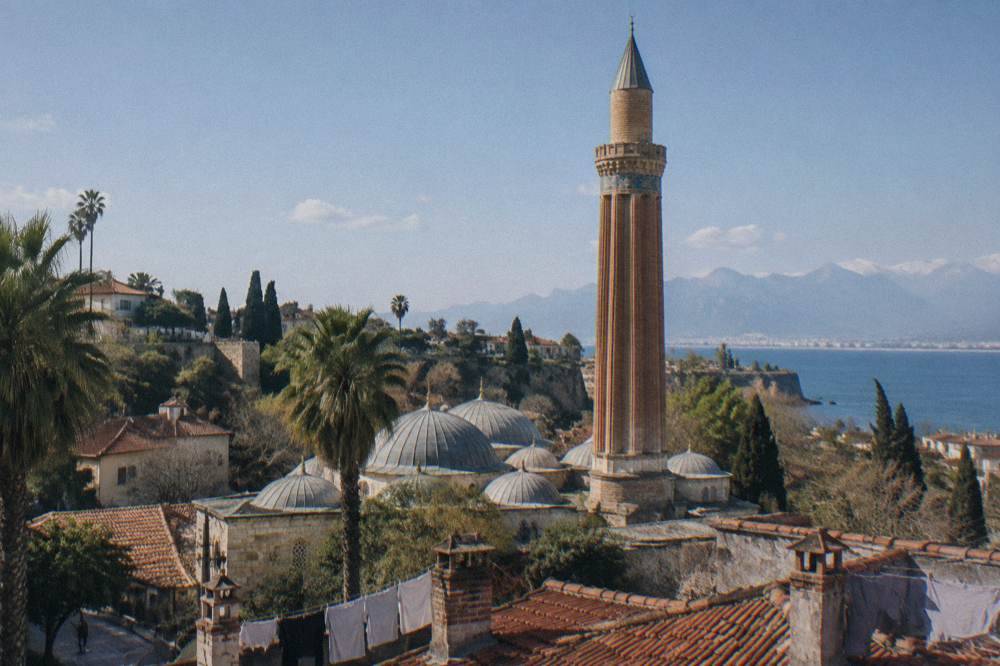 Fluted minaret of the Yivli complex rising over Kaleici rooftops