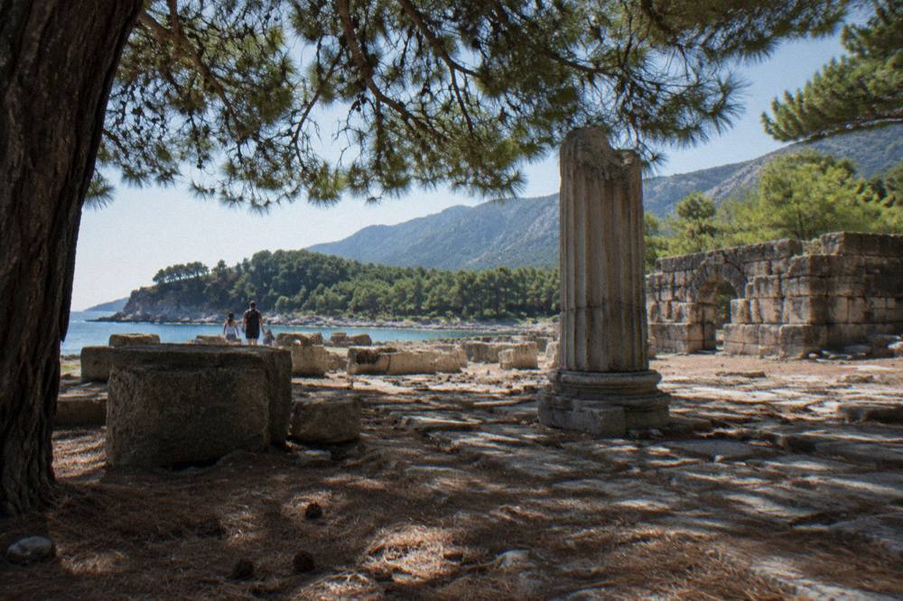 Ancient stone ruins and pine trees at the Phaselis archaeological site