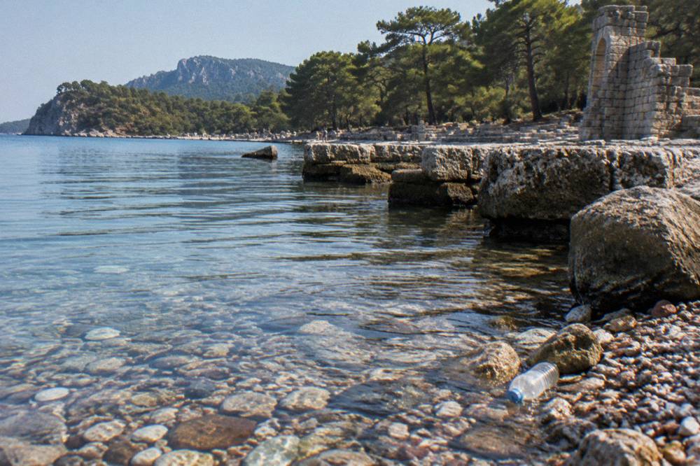 A quiet bay with ruins along the shoreline at Phaselis